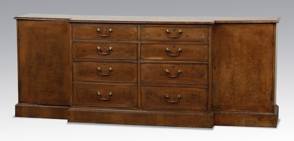 20th c. English burl wood credenza: 20th century English burl wood breakfront style credenza, with two sets of drawers over faux drawer panels opening to filing space, raised on a molded block base, 31.5"h x 80"w x 18"d.