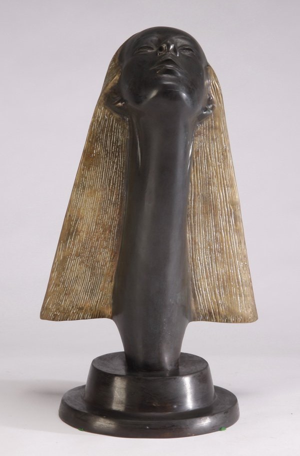 Art Deco inspired bronze female bust: Late 20th century Art Deco inspired bronze female bust with stylized wind-blown hair, in the manner of Rene Lalique's famous "Spirit of the Wind" or "Victoire" car hood ornaments, 20"h x 9.5" diameter