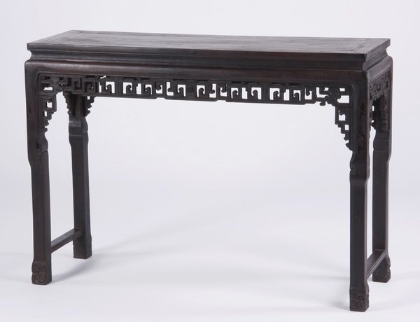 19th c. Chinese carved zitan altar table: Late 19th or early 20th century Chinese carved zitan altar table, the waisted rectangular top surmounting the fretwork apron and spandrels, raised on shaped legs joined by side stretchers, 34.5"h x 47