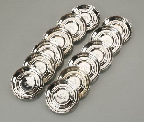 (12) Sterling silver coasters, marked: Set of 12 sterling silver circular coasters, monogrammed "CGS", marked sterling, each 3.5" diameter.