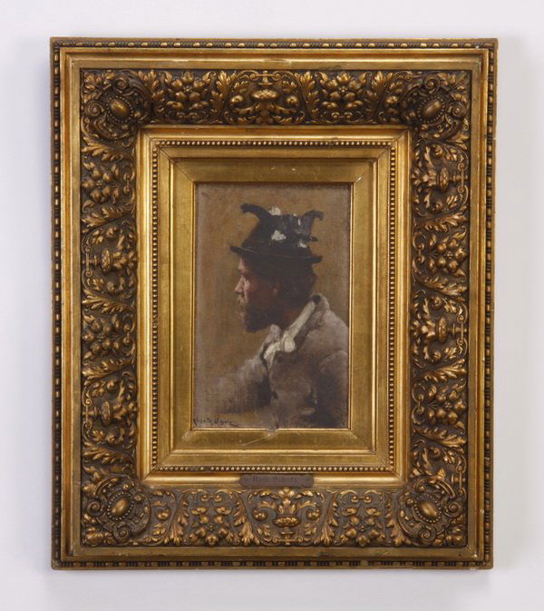 Richard Scholz signed, oil on panel: Late 19th or early 20th century oil on panel portrait of a man in profile, signed Richard Scholz, (German 1860 - ) in a carved gilt wood frame, paper tag en verso in German, 9.5"h x 6.25"w, overall si