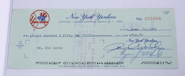 1973 NY Yankees check to Joe Louis: New York Yankees business check dated June 19, 1973 and made payable to Joe Louis, signed en verso by Joe Louis and his wife Martha, written on the 27th anniversary of the heavyweight boxing champions