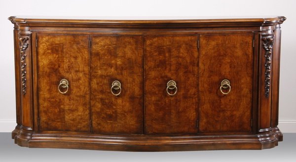 94"w Henredon cabinet or sideboard: Late 20th century demilune cabinet or sideboard by the Henredon Furniture Co. with mahogany book matched veneer top and burl mahogany doors, the bowed front with four doors with large central brass pu