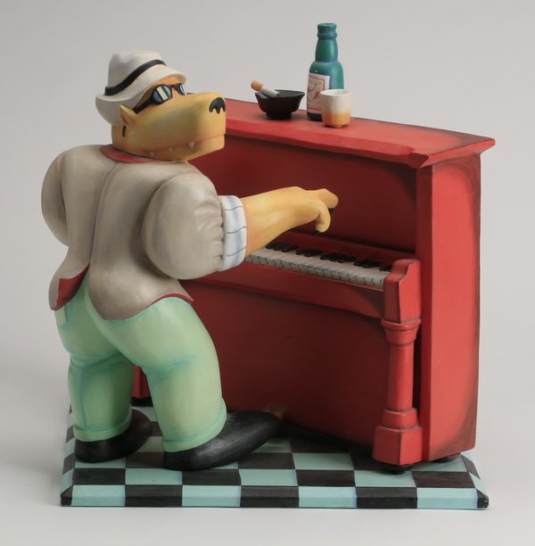 Markus Pierson signed sculpture: 20th century artist signed limited edition polychrome decorated wood sculpture, depicting a piano-playing coyote, #52/250, artist signed and dated Markus Pierson '96, overall 17"h x 16" square base.