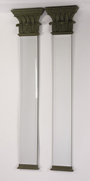 (2) Mirrored pilasters: Pair of late 20th century beveled mirrors, in the form of pilasters, set within a molded cornice top and acanthus base, 73.75"h x 15.25"w x 23"d.