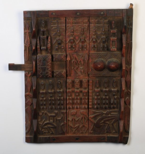 African carved wood grain bin door (1 of 4)