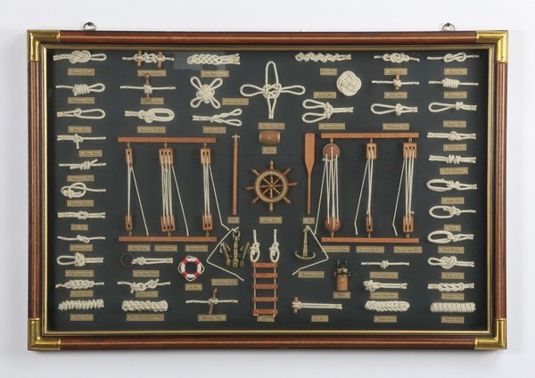 Framed collection of sailor's knots: Framed collection of sailor's knots and other maritime accessories, with plaques defining them, overall size including frame 23.5"h x 36"w x 1.5"d.
