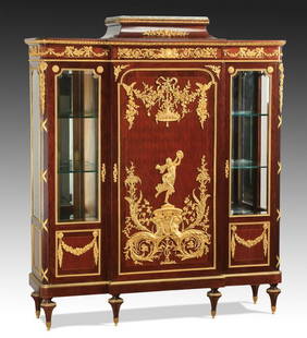 Exceptional 19th c. French cabinet: Exceptional 19th century French cabinet, the mahogany case with raised cavetto top, surmounted with marble, above the cornice adorned with dore' bronze ormolu trim, with mirrored-back display sides fl