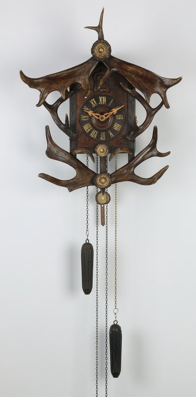 Carved Black Forest cuckoo clock with antlers (1 of 3)