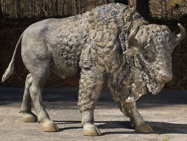 Patinated bronze sculpture of bison, 69"l (1 of 3)