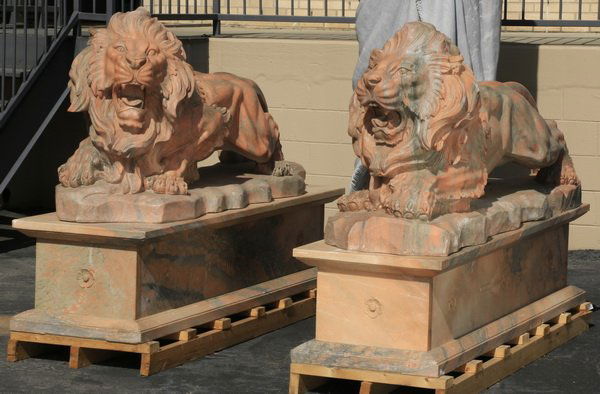 Carved peach marble lions on plinths, 81"l (1 of 7)