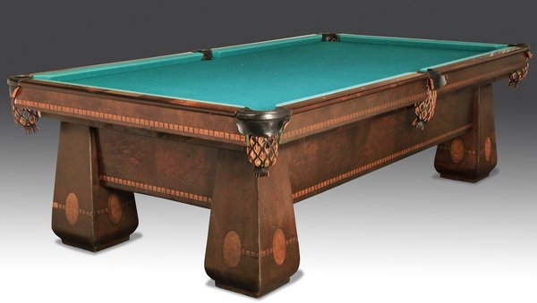 Pool table by Brunswick Balke-Collender, 1928: Brunswick 'Medalist' pool table manufactured by the Brunswick Balke-Collender Company, circa 1928, executed in burlwood with bird's eye maple marquetry inlay, the whole resting on four elephant column
