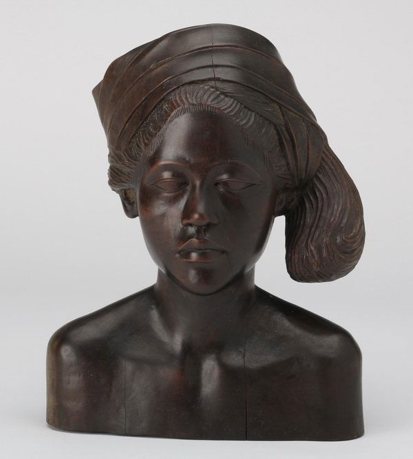 Carved ebony bust of an African woman: Carved ebony bust of an African woman wearing a headscarf, 9.75"h x 7"w x 3"d.