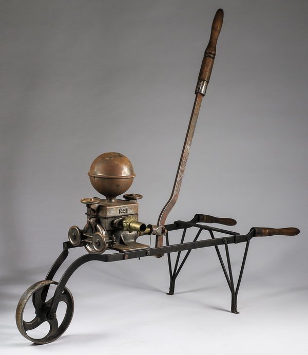 Vintage French wine pump, 46"long: Vintage French wine pump, having wood handles and a single wheel for mobility, a metal plate stamped "Robour" with a French bumble bee symbol attached on one side and "1421" "1411RS" stamped on the ot