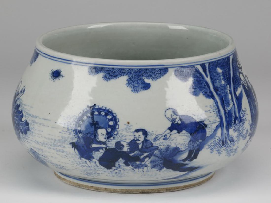 Chinese porcelain brush washer: Chinese blue and white porcelain brush washer, the bombe' form with a continuous scene painted in cobalt blue, depicting figures at leisure in a pastoral setting, surrounded by double ring borders, 5.