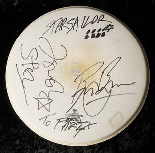 Starsailor: Stage-played Remo drumskin signed by band: Starsailor: Stage-played Remo drumskin signed by band members with photograph of The Strokes, in black marker pen and brio, dedicated, 2003, with a black and white photograph of the The Strokes by