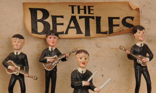 The Beatles: figurines, Invicta Plastics brooch & two: The Beatles: figurines, Invicta Plastics brooch & two scatter pinsA set of Beatles figurines marked Hong Kong No167BB, The Fabulous Beatles Jewellery Brooch in the form of a guitar shaped brooch