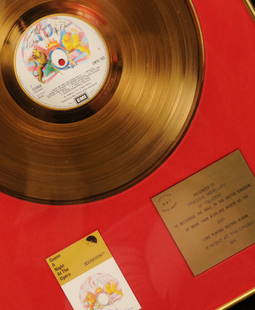 Queen: BPI Gold Award, ‘A Night at the Opera', 1975: Queen: A BPI Gold Award for the album 'A Night at the Opera', 1975 presented to Freddie Mercury, in recognition of more than £250,000 worth of sales in the UK