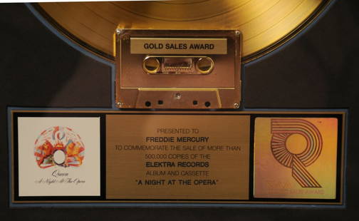 Queen: RIAA Gold Award ‘A Night at the Opera’: Queen: RIAA Gold Award for the album 'A Night at the Opera'presented to Freddie Mercury, to commemorate sales of more than 500,000 copies in the USA, RIAA certified