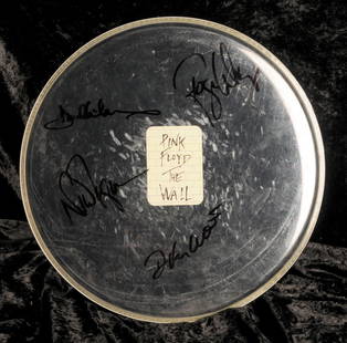 Pink Floyd: A drum skin signed by the band, 1980s: Pink Floyd: A drum skin signed by the band, 1980s, the Remo Weatherking drum skin signed in black marker pen by Roger Waters, David Gilmour, Nick Manson and Richard Wright, with applied paper label