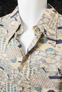 Elvis Presley: patterned shirt by Monticello, 1960s: Elvis Presley: previously personally owned and worn patterned shirt, Monzini knit by Monticello, 1960s a blue and white patterned long-sleeved shirt labelled Monzini knit by Monticello previously
