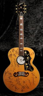 Gibson acoustic guitar signed by American Country Music: Gibson acoustic guitar signed by American Country Music stars, 1999, including She Daisy, The Wilkinsons, Lonestar in black marker pen