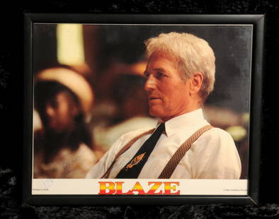 Paul Newman: autographed still from 'Blaze', 1989: Paul Newman: autographed still from 'Blaze', 1989, signed in blue ball point pen to lower left hand corner, glazed and framed