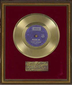 Englebert Humperdink 'Release Me' Award: An Australian presentation disc awarded to Engelbert Humperdinck for 'Release Me', 1970 An in-house gold presentation disc award presented to Engelbert Humperdinck by E.M.I. (Australia) Limited