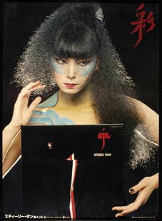 Steely Dan signed record and poster: Steely Dan signed record and poster A set of autographs on the cover of the LP AJA along with a Japanese poster promoting the release of the LP. (2) Upon bidding it will be deemed that you have