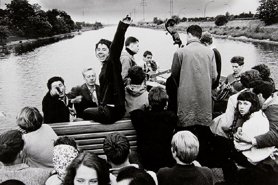 WILL MCBRIDE (1931-2015): Riverboat Shuffle ('Jazz auf dem Fluss'), 1959 Gelatin silver print, 1970s, 25,3 x 37 cm Signed, annotated and dated by the photographer in pencil on the reverse The buyers premium for all items expor