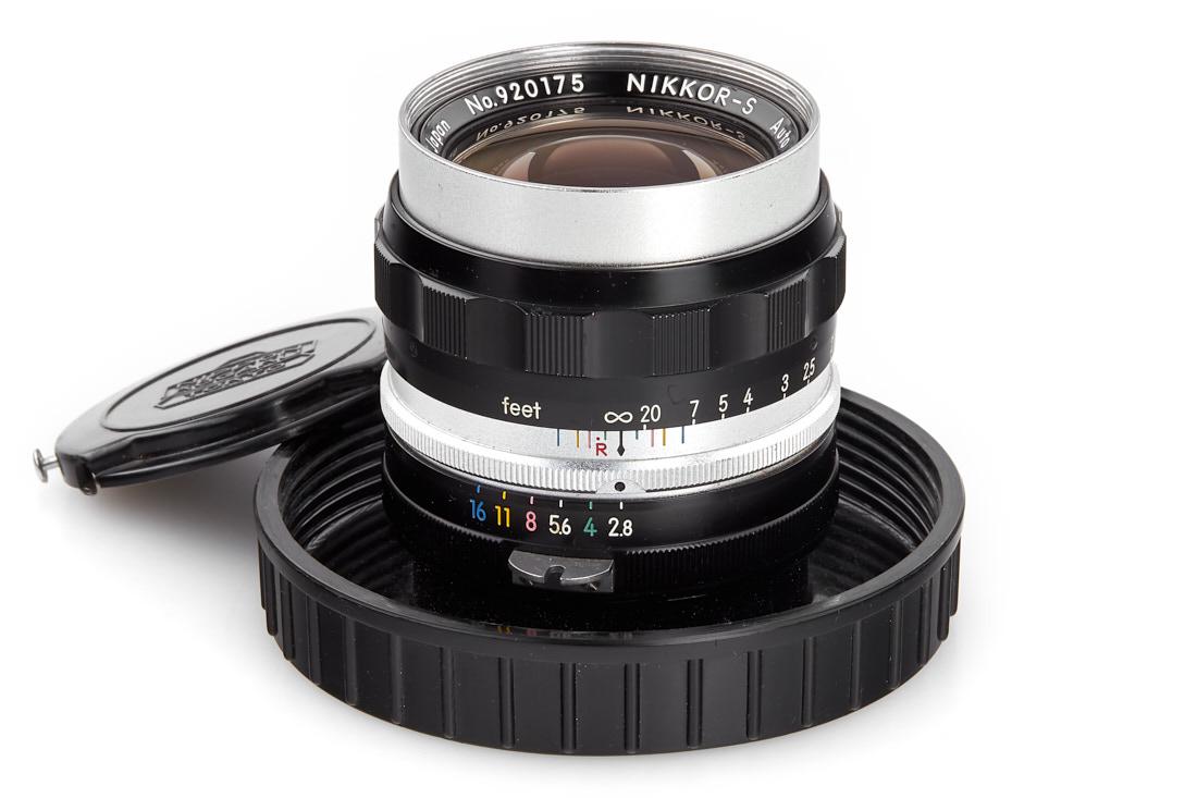 Nikon Nikkor-S 2.8/3.5cm *, 1959, no. 920175: "Tick Mark" lens for Nikon F, in good condition (minimal cleaning marks on rear element), with original front cap in plastic keeper The buyers premium for all items exported out of E.C. (European Comm