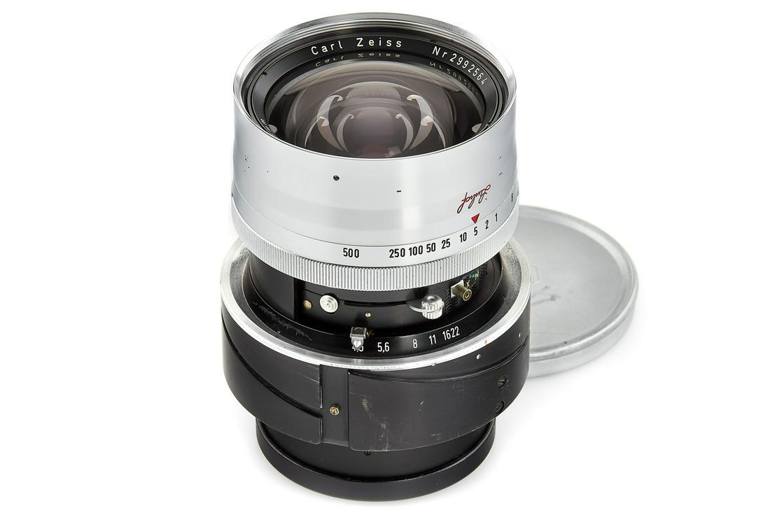 Carl Zeiss f. Graflex XL Biogon 4.5/53mm *: A Very Rare Lens In Original Graflex Mount, In Excellent Condition, Very Good Optics, With Front And Rear CapThe Buyers Premium For All Items Exported Out Of E.C. (European Community) Is 25%. For Item