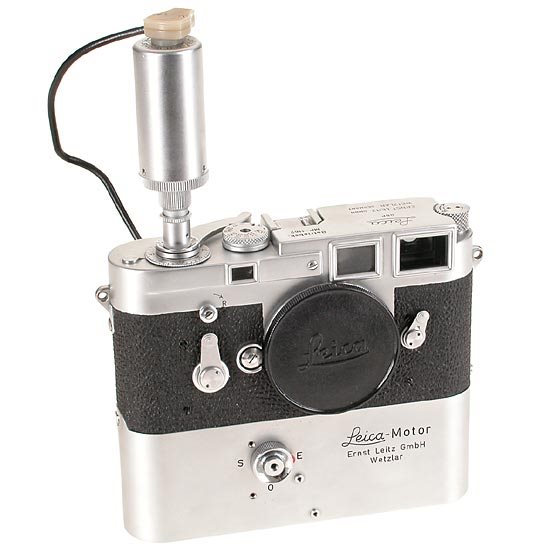 LEICA M-Cameras: Betriebsk. MP-1167: Before a small series of 27 MP2 cameras were produced, Leitz Wetzlar had already made tests with an electric motor drive for the M-series in 1956. According to the works records, this camera was given