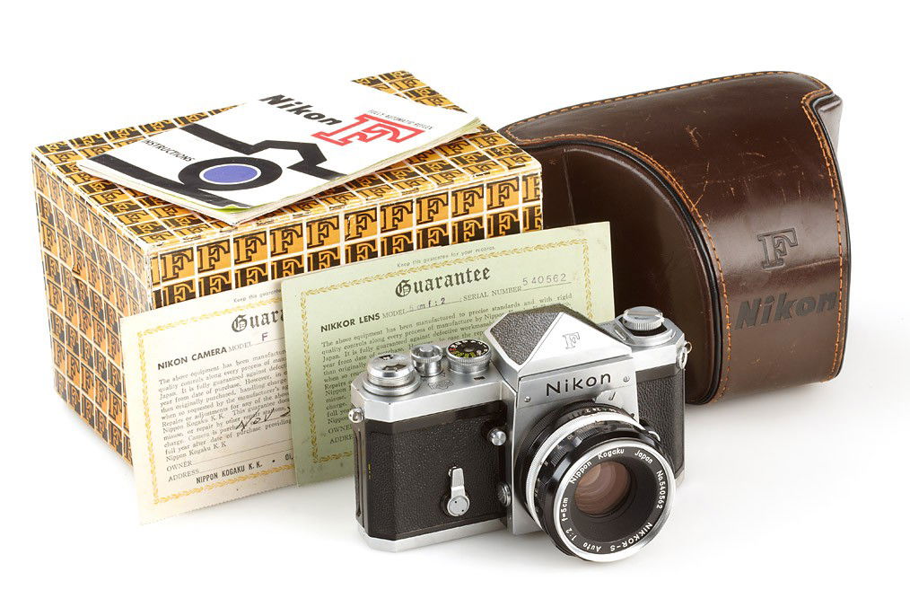 Nikon F Eyelevel chrome: early Tokyo body in fine condition with Nikkor-S Auto 2/5cm no.540562, cap, brown everready case, early instruction book and warranty card with matching number, maker's box