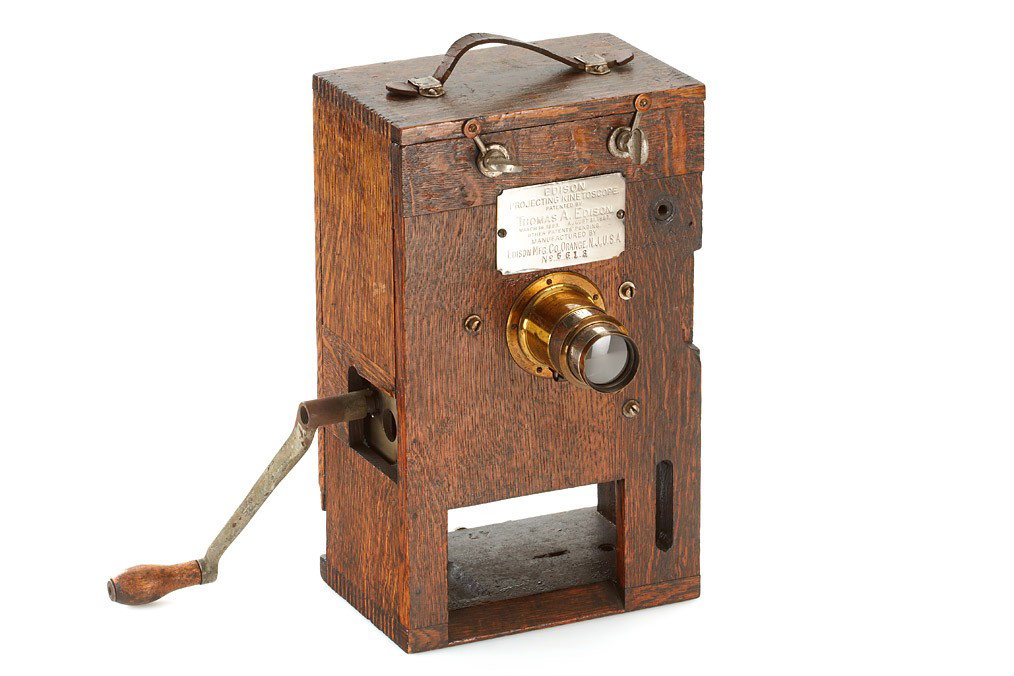 Edison Projecting Kinetoscope: 35mm motion picture projecting mechanism with oak body, nickel-plated maker's plaque 'Patented by Thomas A. Edison, March 14, 1893, August 31, 1897, Other Patents Pending, Manufactured by EDISON MFG. 