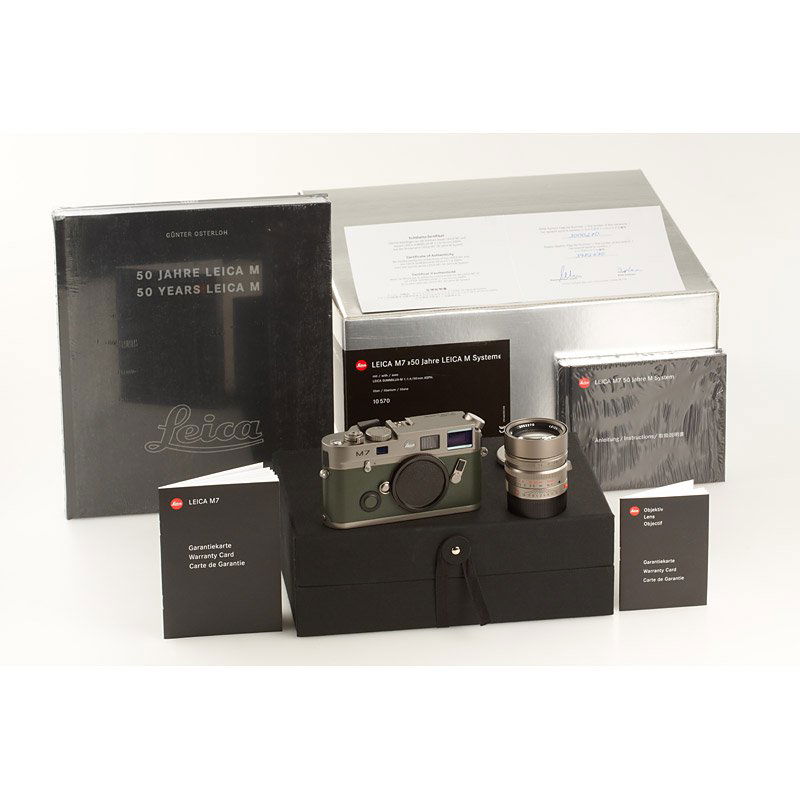 M7 Titan '50 Years Leica M System' 10570, SN: 3000: limited edition M7 in titanium finish, a unique camera made by special order with racing green leather covering, a few minimal signs of use on the leather covering and strap lug protectors, complete w