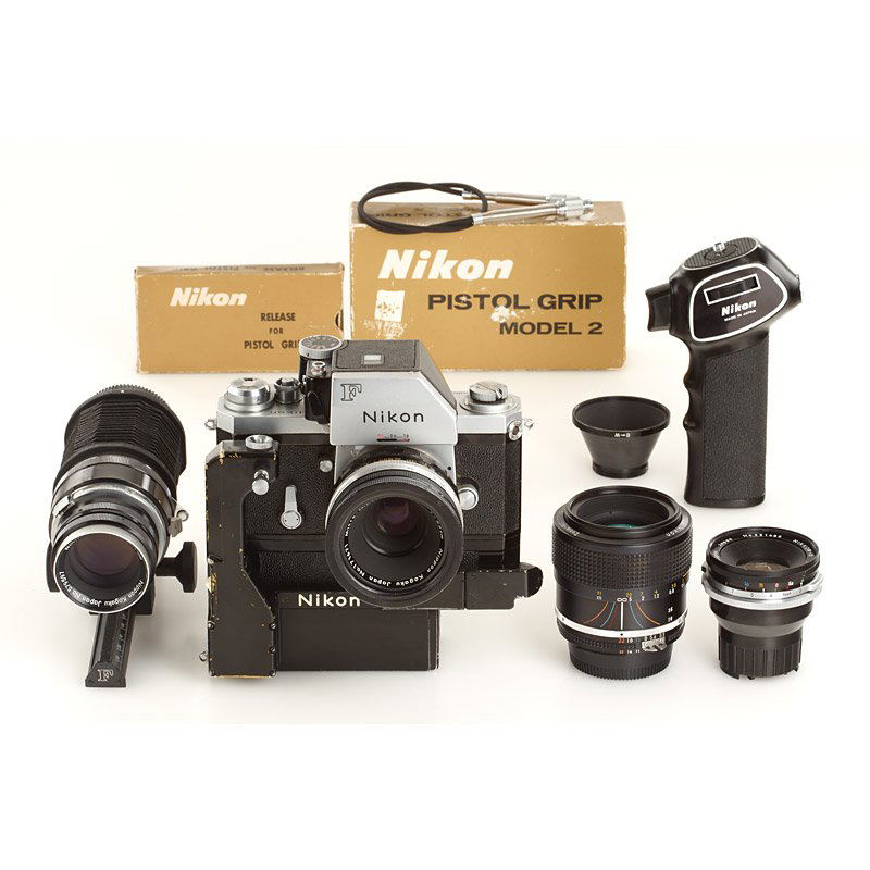 Nikon F Chrome Photomic TN outfit, SN: 7075509, 19: outfit including (1) used body (cond.C, slow speeds sticky) with Photomic TN prism finder no.441693 (not operable), F-36 Motor Drive type 9 no.136271 with cordless battery pack no.91742, (2) rare firs