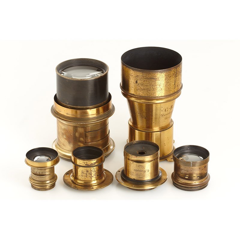 French Brass Lenses (various): (1) Anzoux & Francais Btes s.g.d.g. Paris no.1449 Petzval lens, focal length c.35cm, lens diameter c.7.5cm, rack and pinion focusing missing, total height: 16cm, (2) Anzoux & Francais Brevetes s.g.d.g
