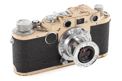 Leica IIc Ivory *: An interesting IIc custom finished in ivory white, with a patina of years of use and good working order, sharkskin covering, with coated Elmar 3.5/5cm no.967688, lens cap.