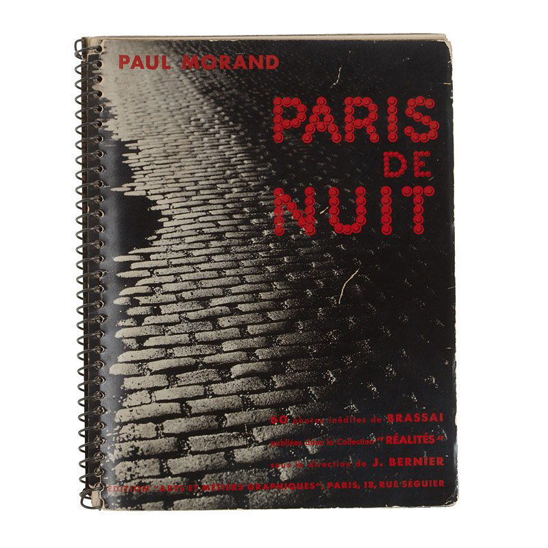 Paris de Nuit (Paris by Night): Brassai‰ (1899 - 1984) , 'Paris de Nuit' (Paris by Night), Paris: Arts et Métiers Graphiques, 1933, Quarto, original spiral bound photo-illustrated card wrappers, with 64 rich full-page photogravur