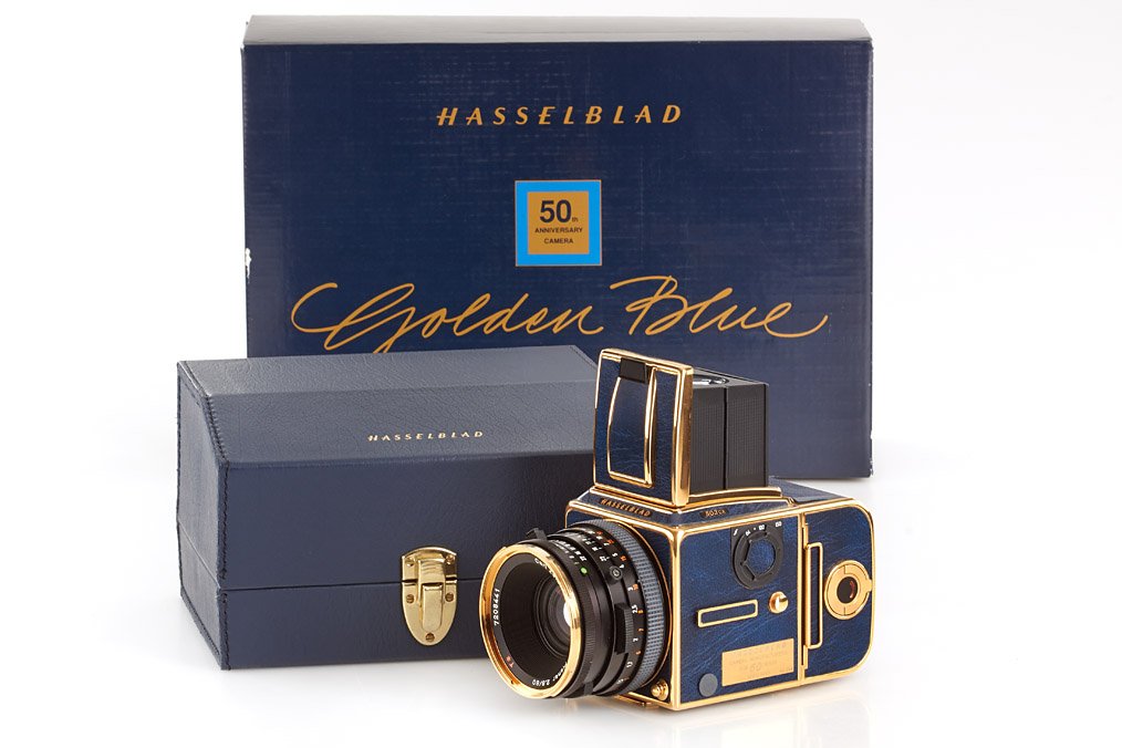 Hasselblad 503CX Golden Blue, ser.no.98, 1991: brand new special edition for the 50th anniversary of Hasselblad company, complete with lens, all accessories, papers, special leather presentation box, maker's box