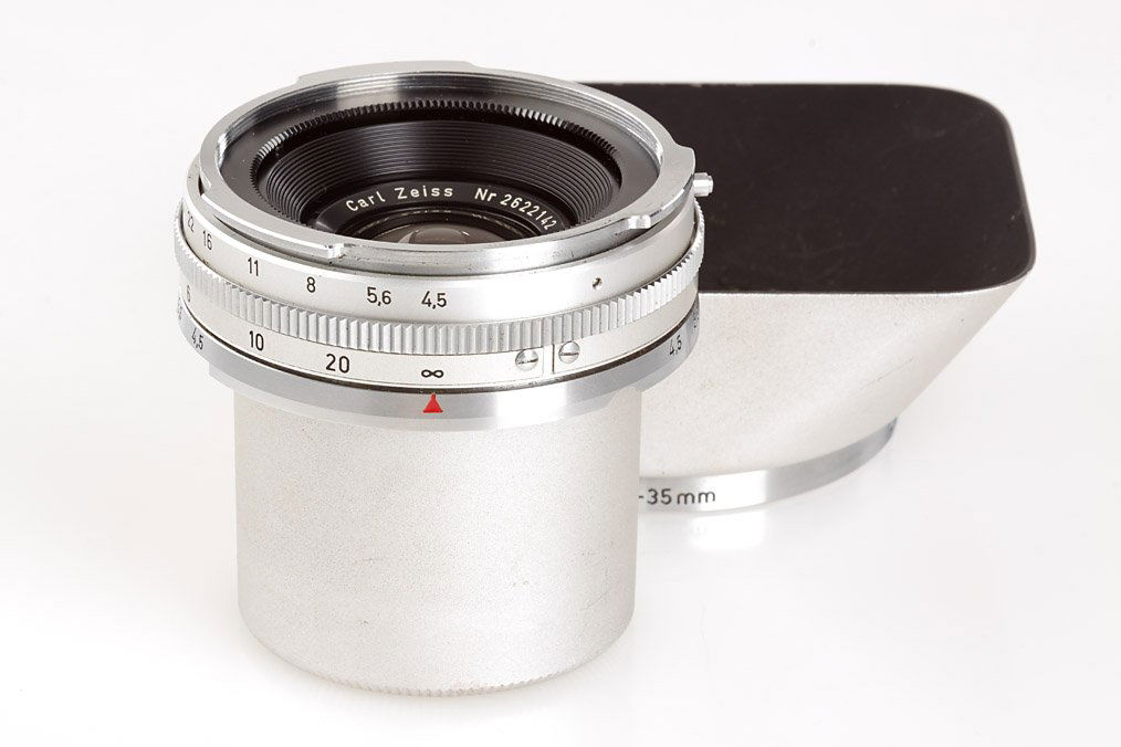 Carl Zeiss Distagon 4.5/21mm, ser.no.2622142, 1963: for Contarex, in mint condition (clean lenses, both original caps), chrome hood