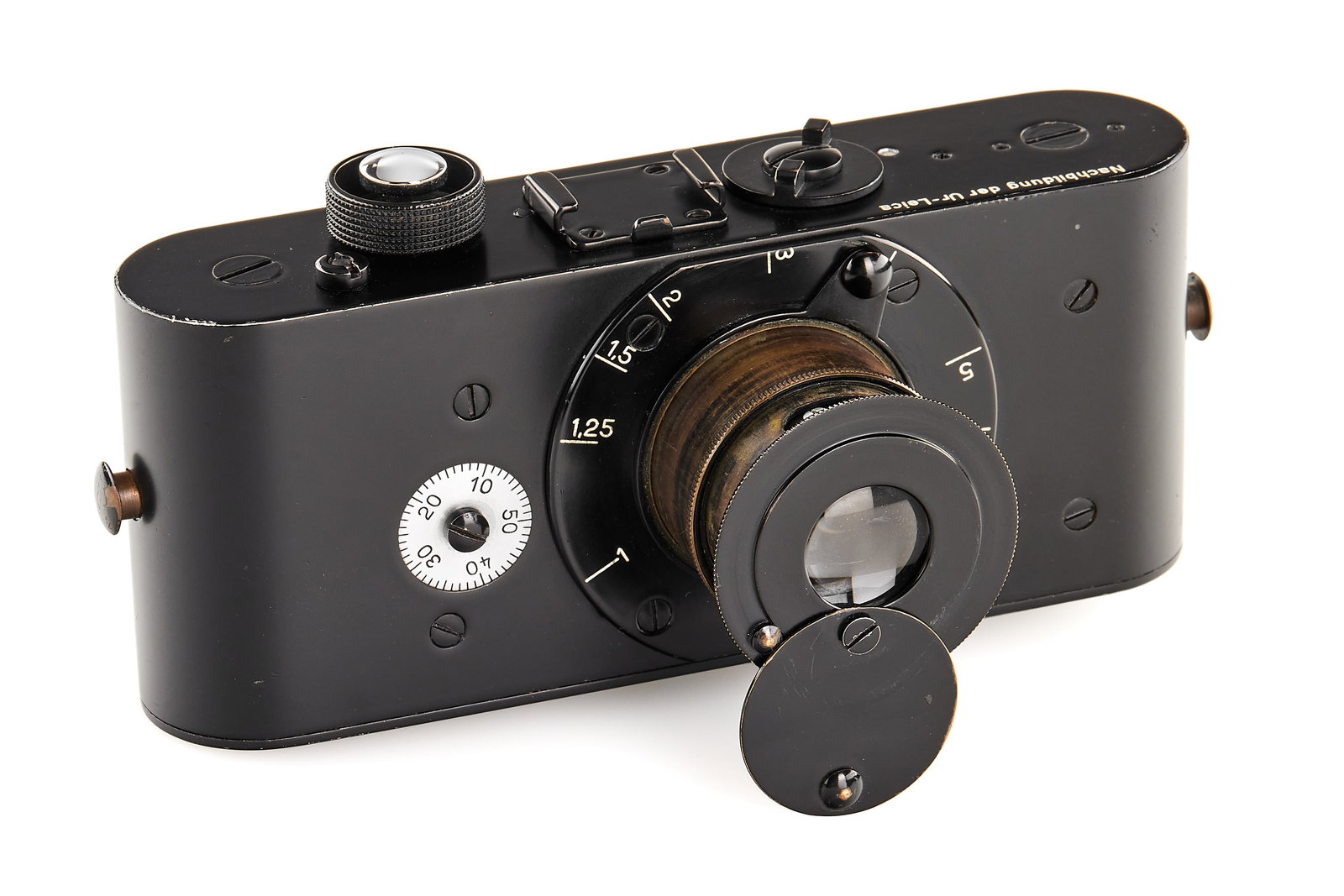 Ur-Leica Replica 940231: Quite rare dummy replica of the Ur-Leica, the first Leica prototype from Oskar Barnack in 1913, produced by Leitz in Wetzlar, in very good condition, with some signs of wear.