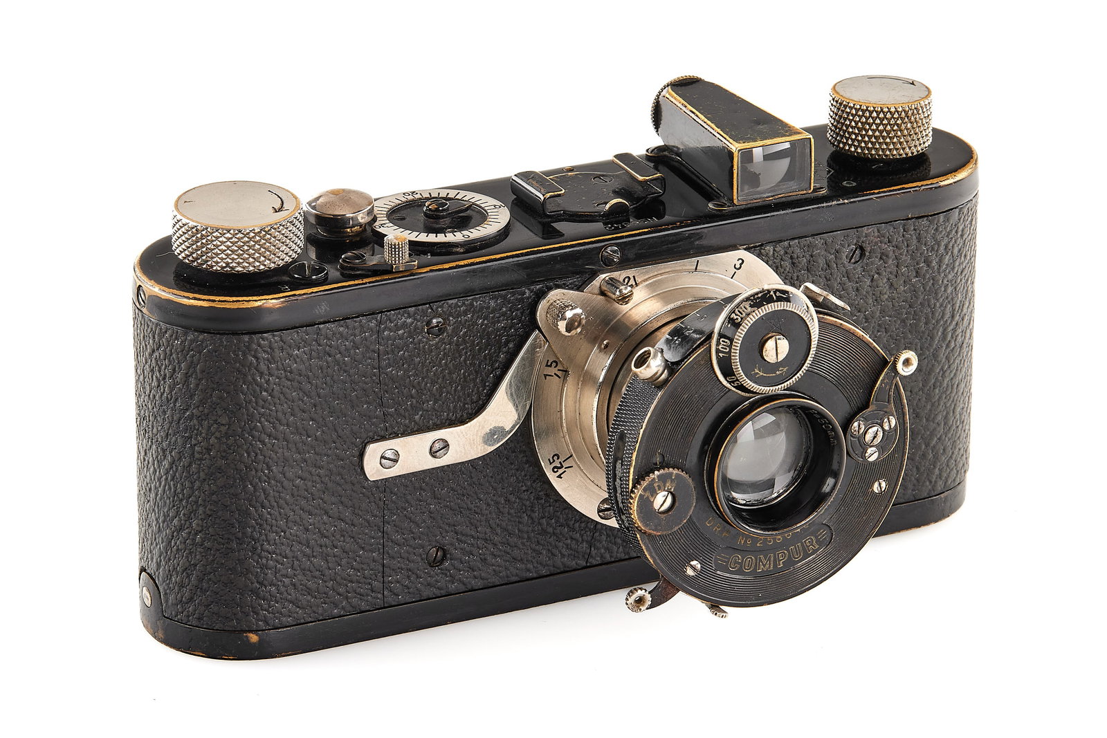 Leica I Mod. B Dial-Set Compur *: First model of the Compur-Leica, with Elmar 3.5/50mm, here in good and original condition, good optics only showing a few light cleaning marks, delivered to Berlin on 29.03.1927, including 2x film