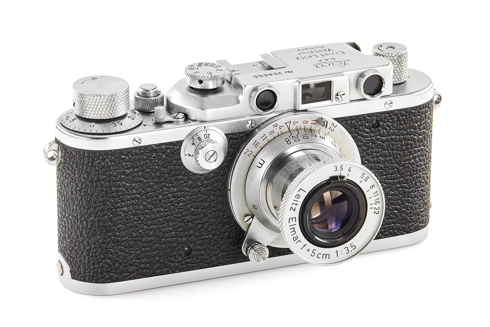 Leica IIIa chrome post-war: Interesting, very rare, late post-war IIIa chrome, officially, production ends with no.357186 (!), in almost mint condition, note the 'Germany' engraved on the top plate, together with red scale Elmar
