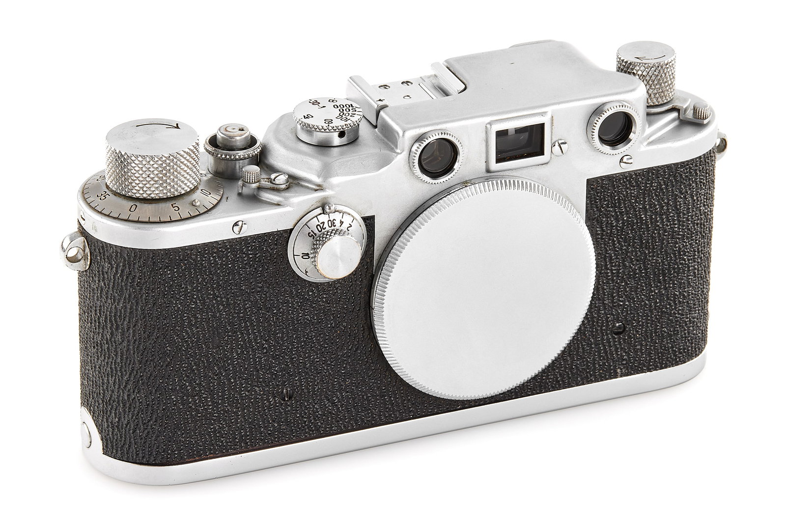 Leica IIIc chrome No Serial Number: Very interesting IIIc wartime without any engravings on the top plate, soft chrome finish and sharkskin covering, note the early style A/R lever located on a small platform and slow speed dial with lo