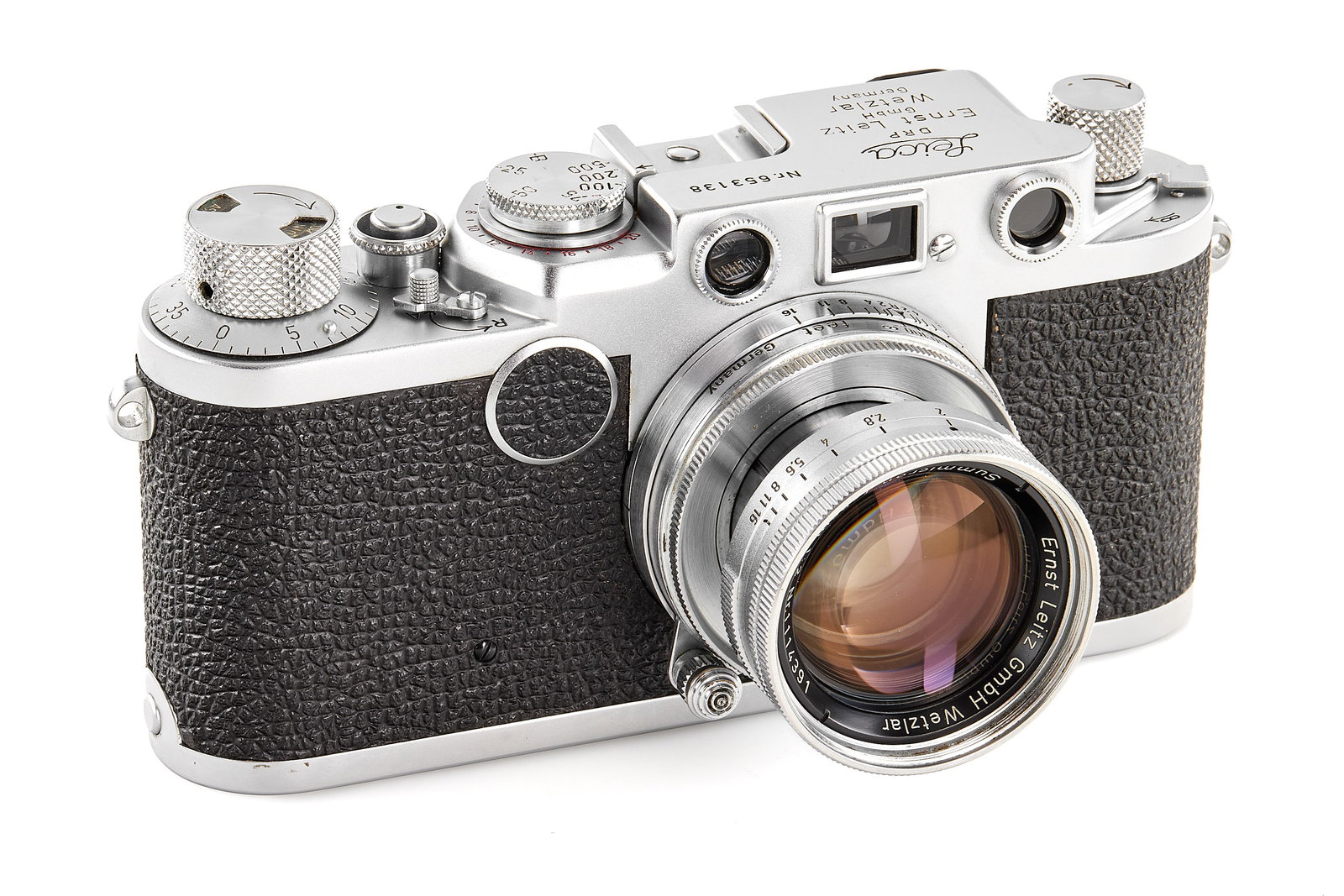 Leica IIf with Summicron 2/5cm: Very nice red dial 1st version IIf with 1/500sec top speed, in near-mint condition, together with collapsible Summicron 2/5cm no.1114391 in feet scale, slightly radioactive optics showing a light sepa