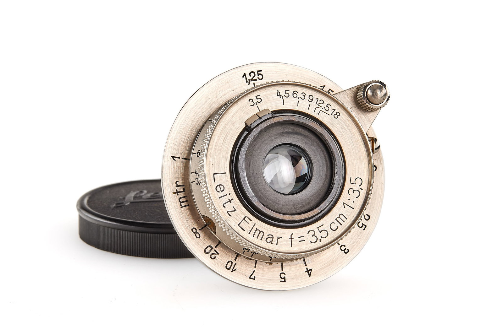 Elmar 3.5/3.5cm nickel: Beautiful early 7 o'clock unnumbered EKURZ nickel Elmar, RF coupled, in almost mint condition, very good optics, with both caps.