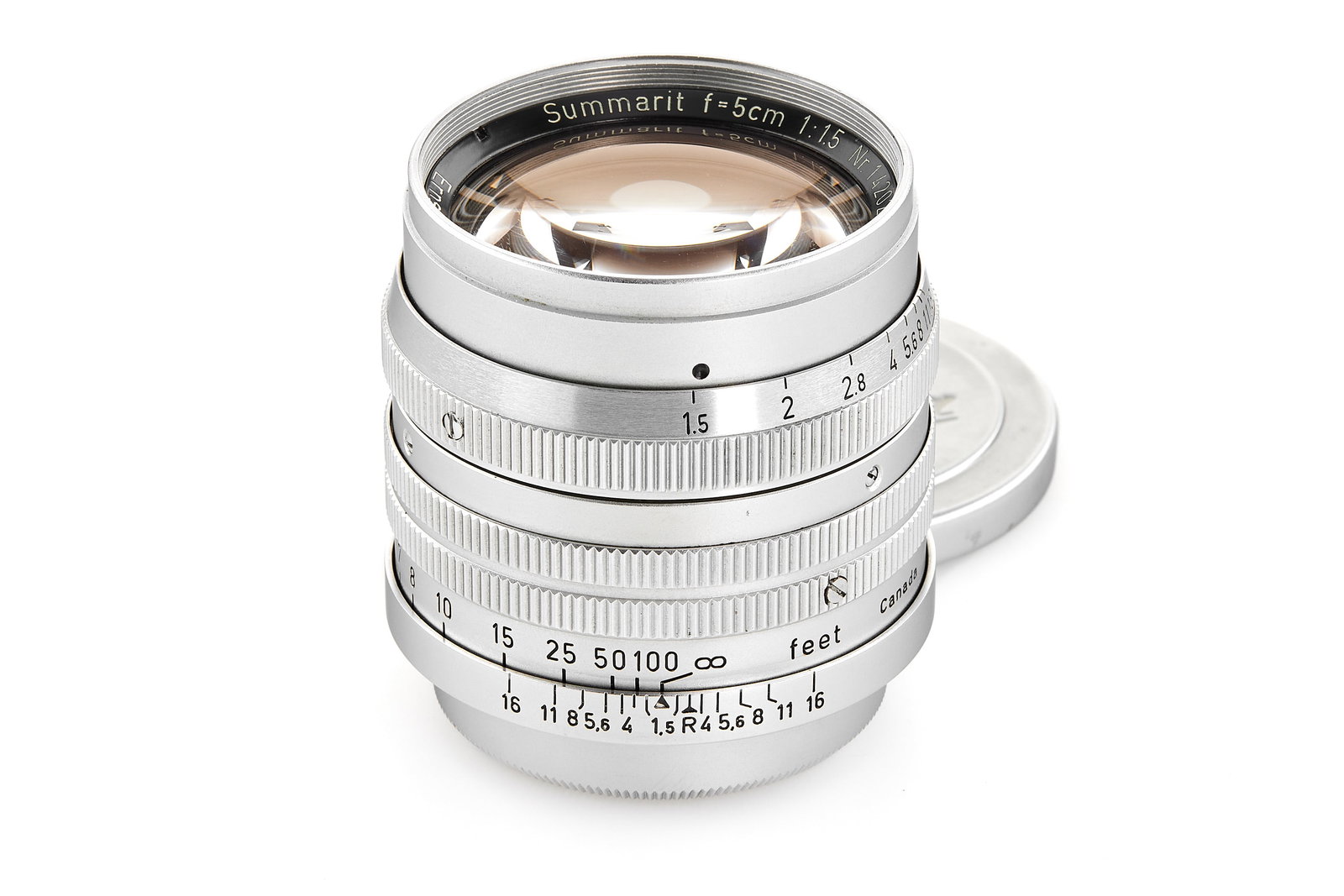 Summarit 1.5/5cm Midland *: Rare screw-mount Summarit with original Midland engraving in almost mint condition, feet scale, good optics only showing a few very light cleaning marks, with both caps. SN: 1420267