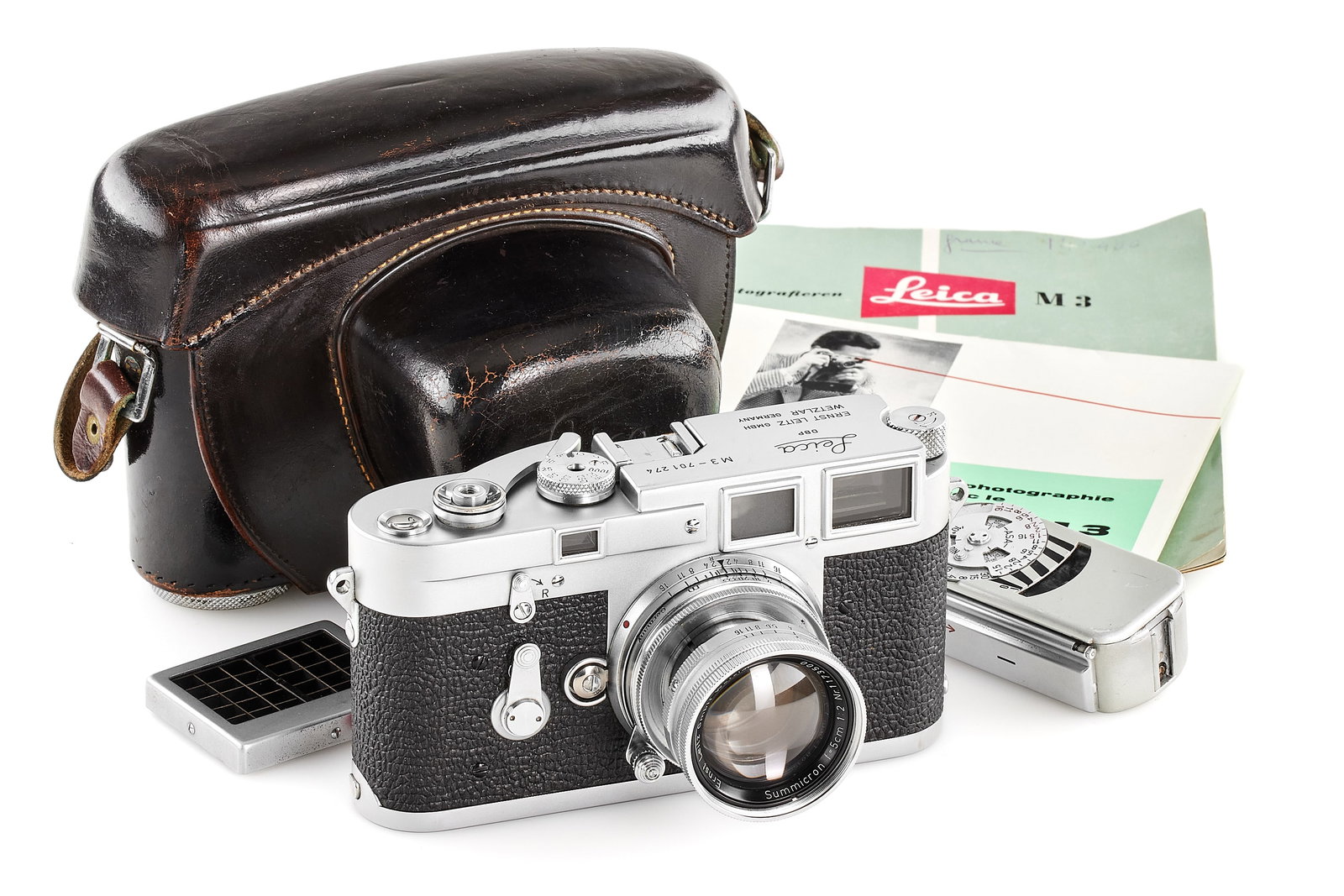 Leica M3 chrome Double Stroke with Summicron 2/5cm: Beautiful early double-stroke M3 chrome in very good condition, some light signs of wear visible on the top plate and rear, still in original condition with all early features such as no frame selecto